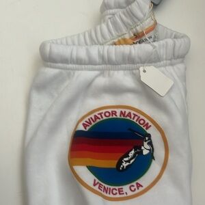 Never worn before with tags Aviation Nation white, drawstring, cuffed sweatpant